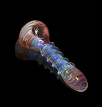a glass pipe with a blue and red stripe